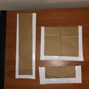 3 multi sized brown bags.